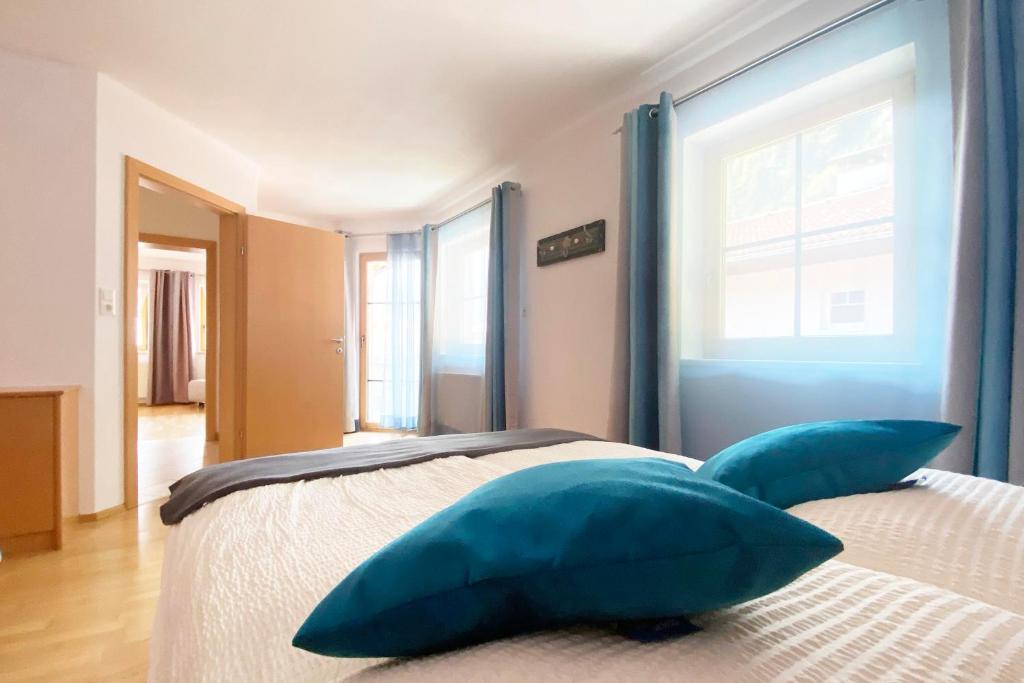 Säng eller sängar i ett rum på Apart Haus Bella