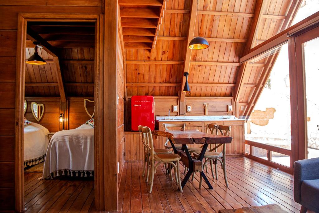 Postel nebo postele na pokoji v ubytování Zidada Hotel and Chalets