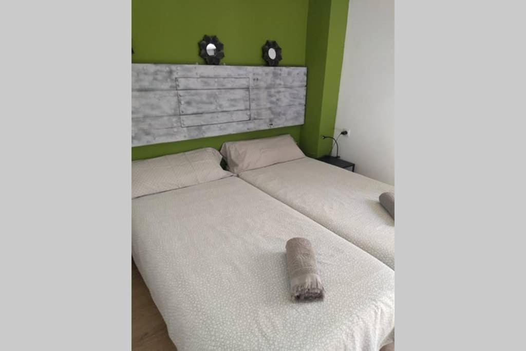 Postel nebo postele na pokoji v ubytování Apartamento Centro Encarnación 1º D