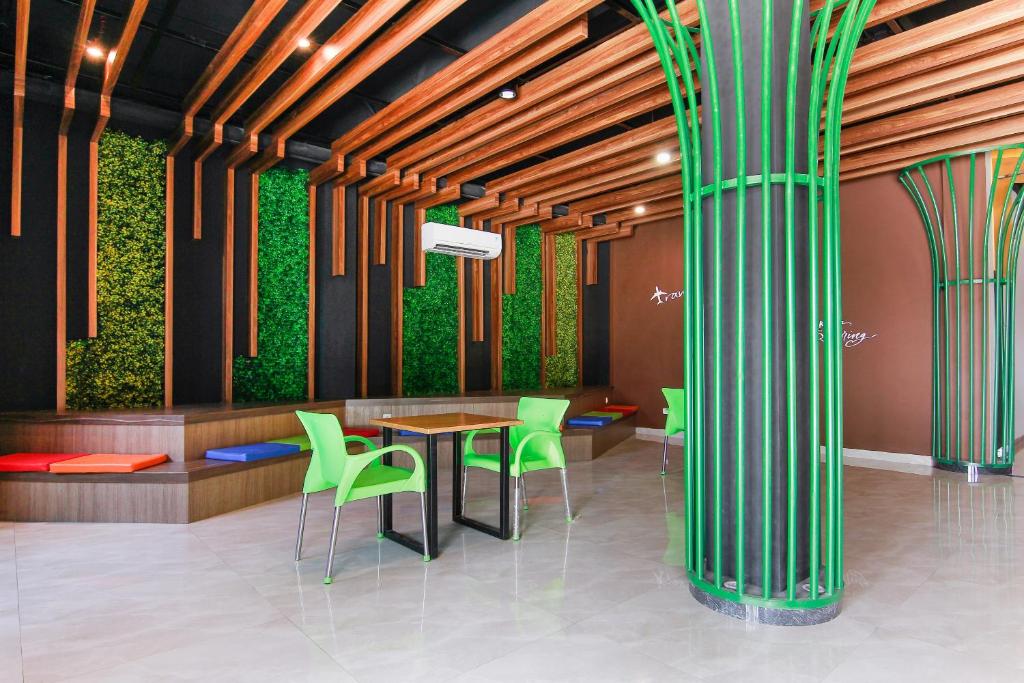 Fotografie z fotogalerie ubytování Capital O 3476 Millenium Inn v destinaci Medan