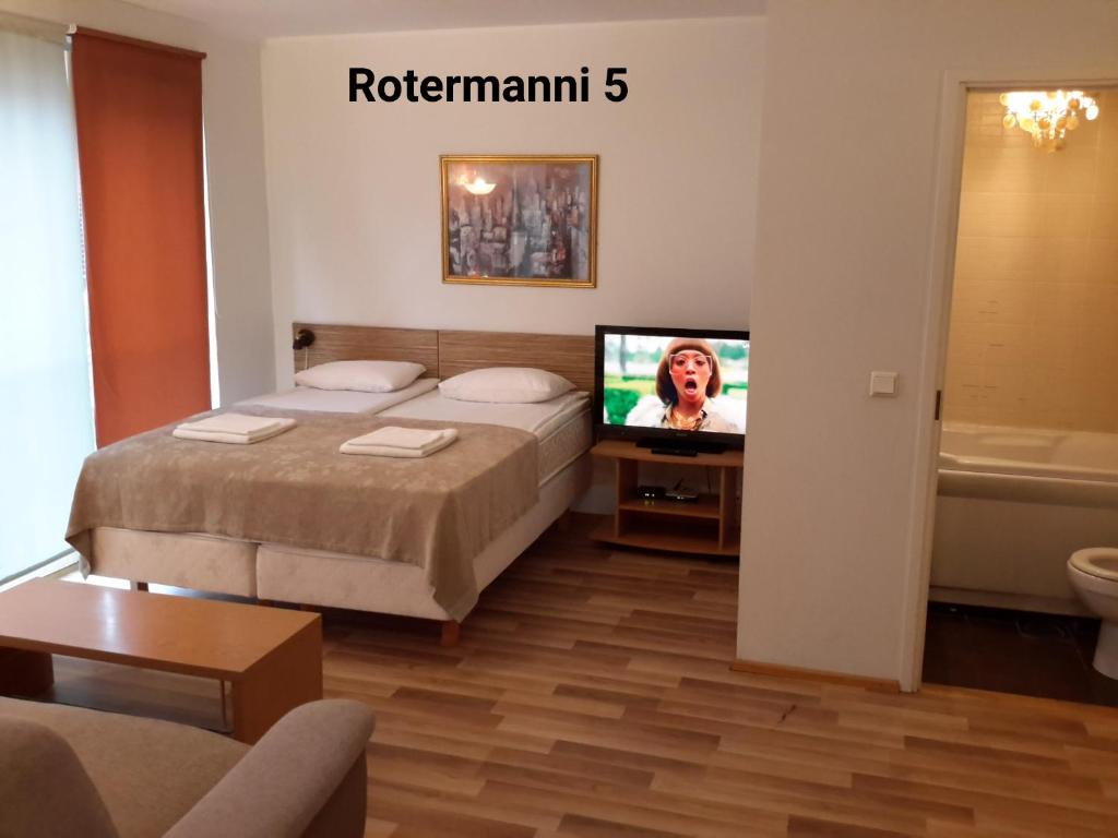 Postel nebo postele na pokoji v ubytování Apartments Rotermanni