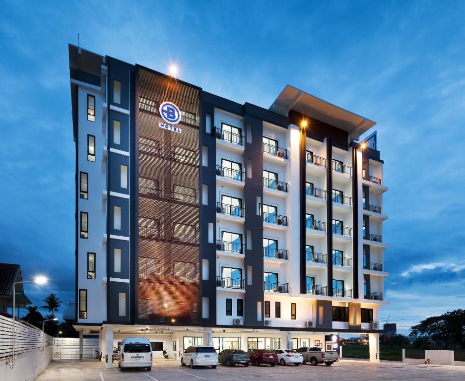 a rendering of a hotel with cars parked in a parking lot at B Hotel in Khon Kaen