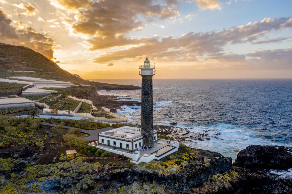 an aerial view of a lighthouse on the coast at Lighthouse on La Palma Island in Barlovento