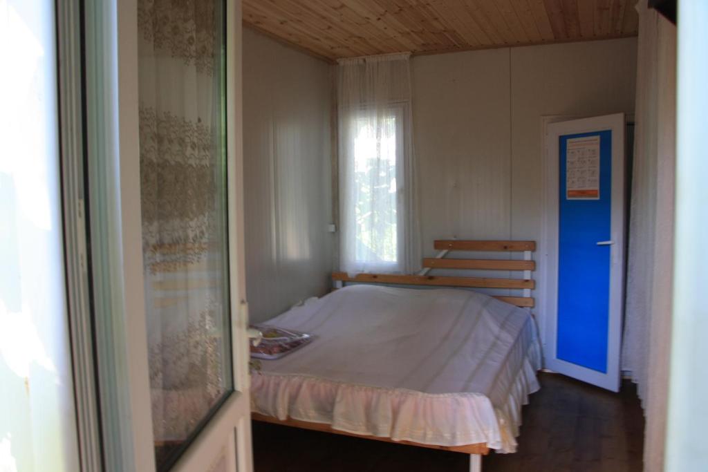 Postel nebo postele na pokoji v ubytování Robinson Crusoe