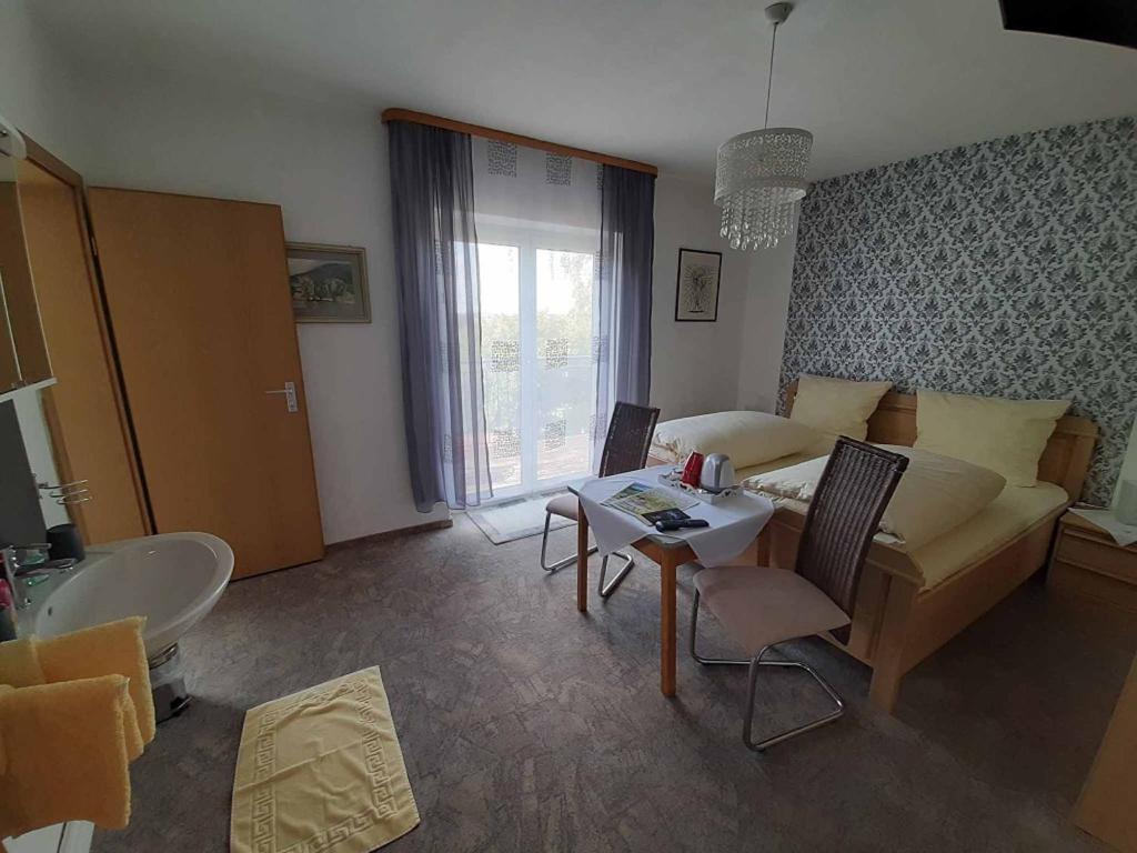 Posezení v ubytování Gästehaus Edelmann