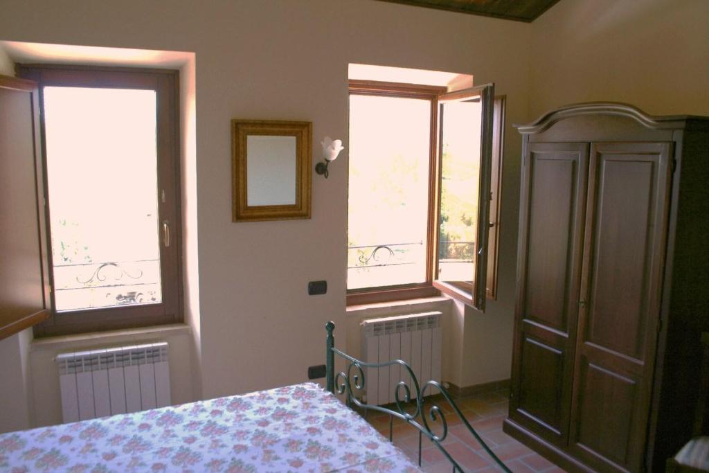 Posteľ alebo postele v izbe v ubytovaní Agriturismo La Cicala