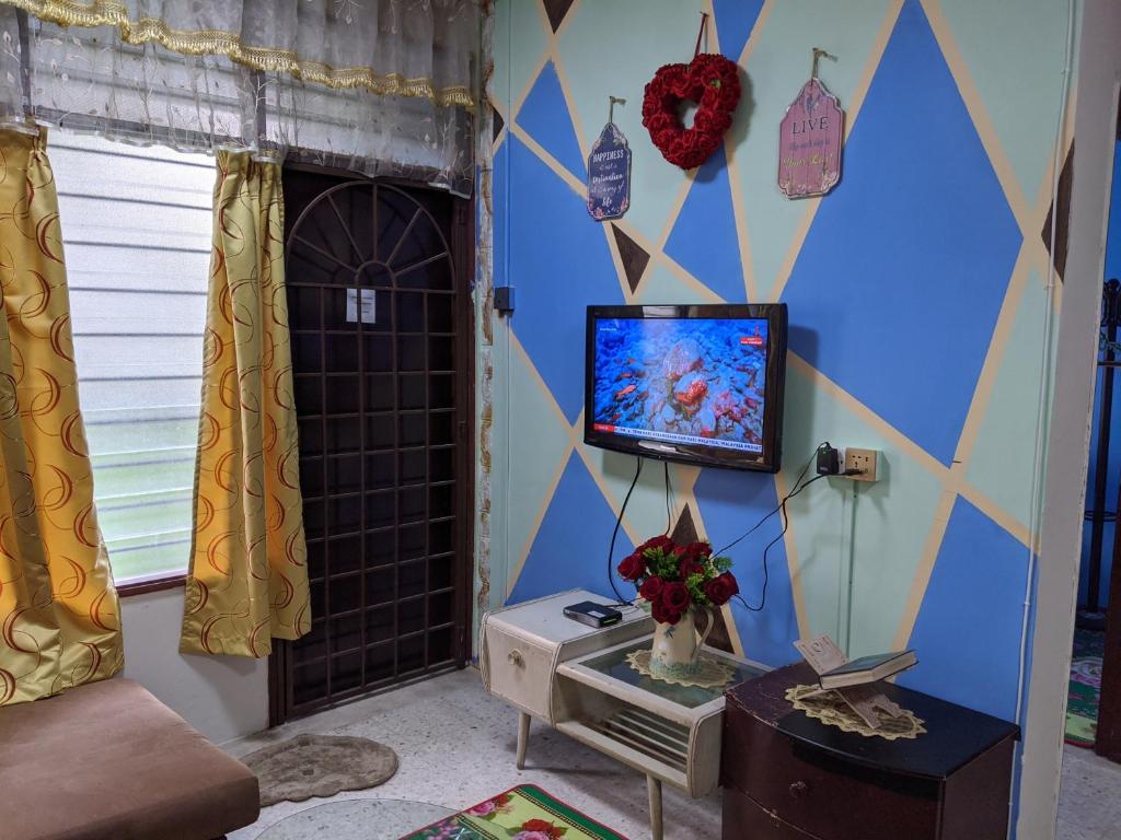 Televisor o centre d'entreteniment de Salam D'Mawar Homestay
