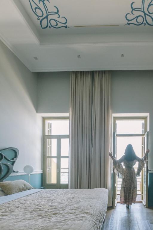 Postel nebo postele na pokoji v ubytování Elia Palatino Hotel
