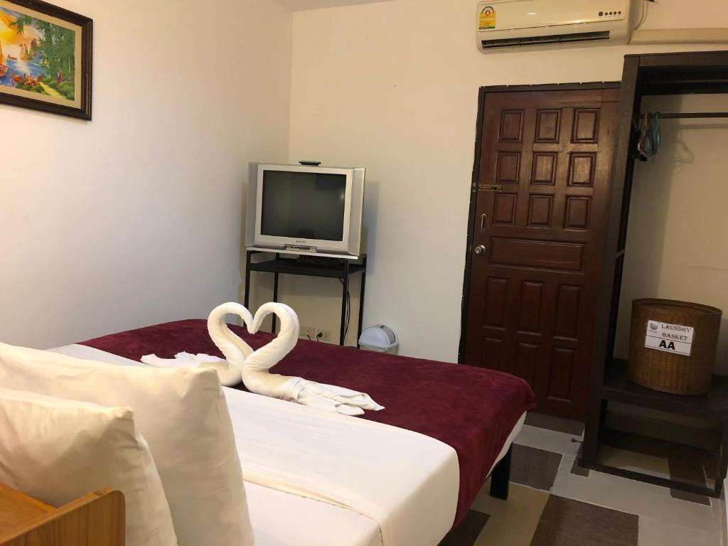 Postel nebo postele na pokoji v ubytování Aumpai Luxury