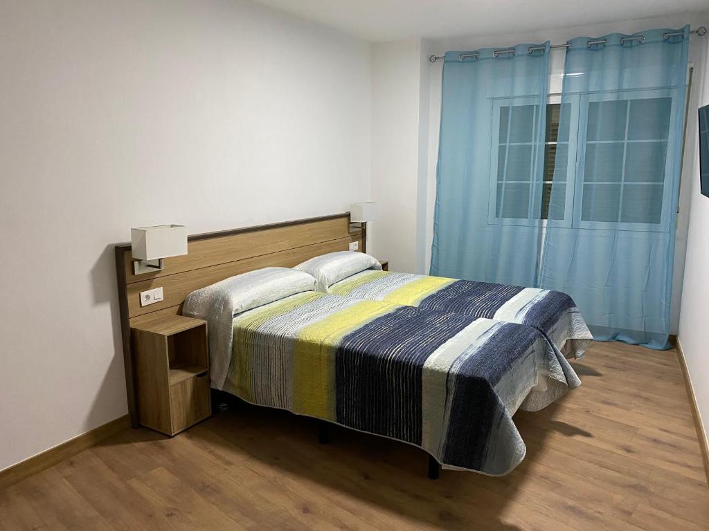 מיטה או מיטות בחדר ב-La Escapada