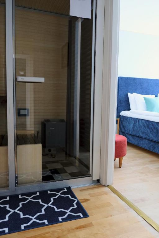 Postel nebo postele na pokoji v ubytování Mora Hotell & Spa