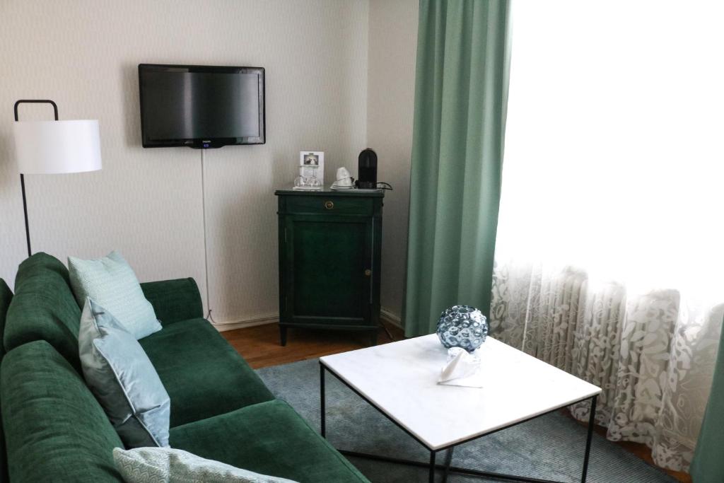 TV a/nebo společenská místnost v ubytování Mora Hotell & Spa