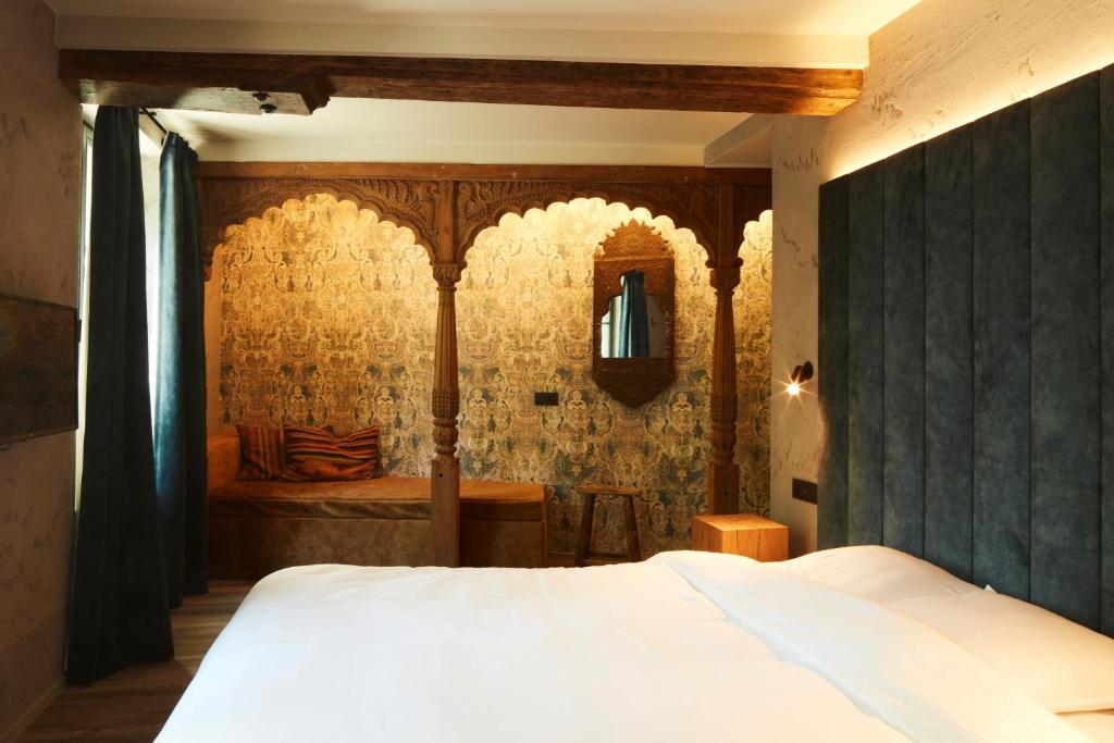 Postel nebo postele na pokoji v ubytování Nonam Boutique Hotel Gent
