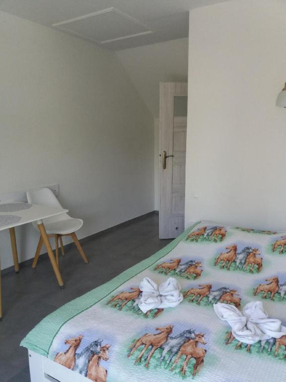 Postel nebo postele na pokoji v ubytování Gościniec Solan