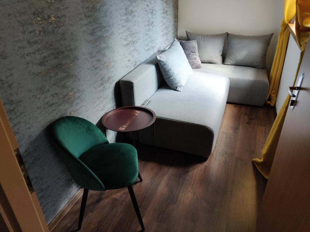 Część wypoczynkowa w obiekcie Apartament Studio 11 Starówka Konin