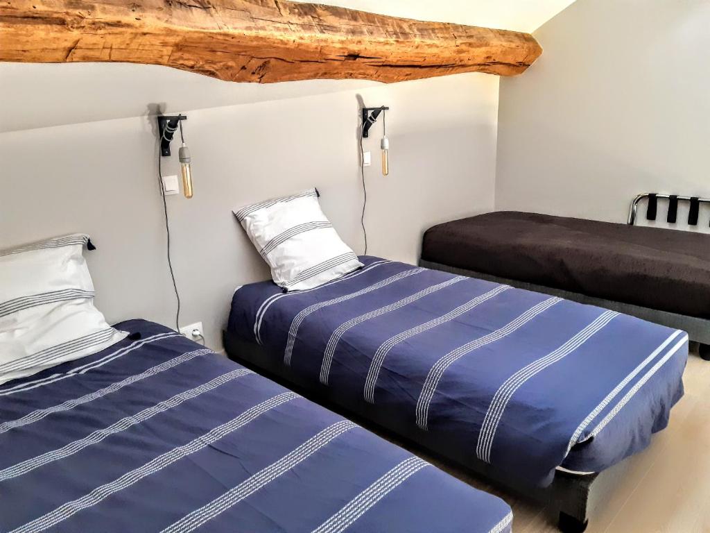 Postel nebo postele na pokoji v ubytování 10 Côté Cour