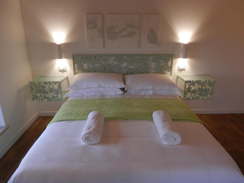 Postel nebo postele na pokoji v ubytování Agriturismo Cjargnei