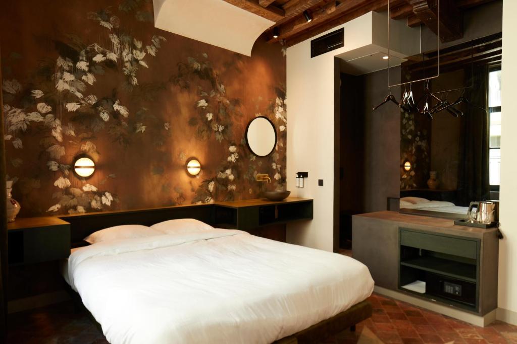 Postel nebo postele na pokoji v ubytování Nonam Boutique Hotel Gent