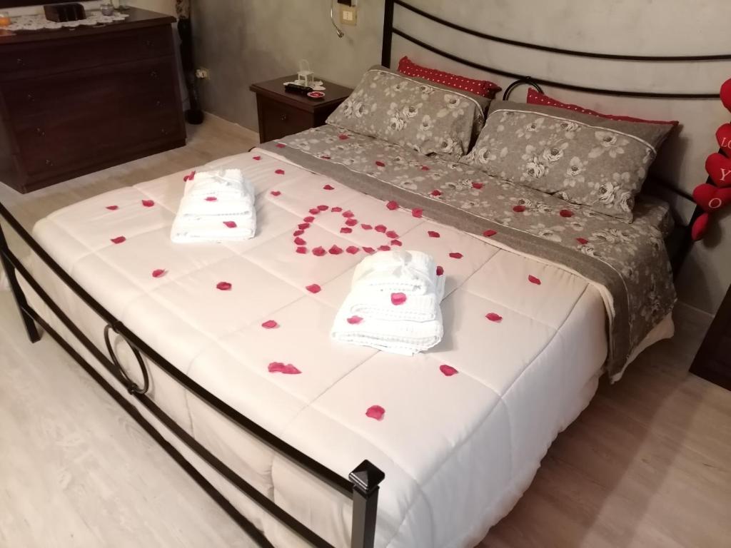 Postel nebo postele na pokoji v ubytování Antica Dimora del Drengot