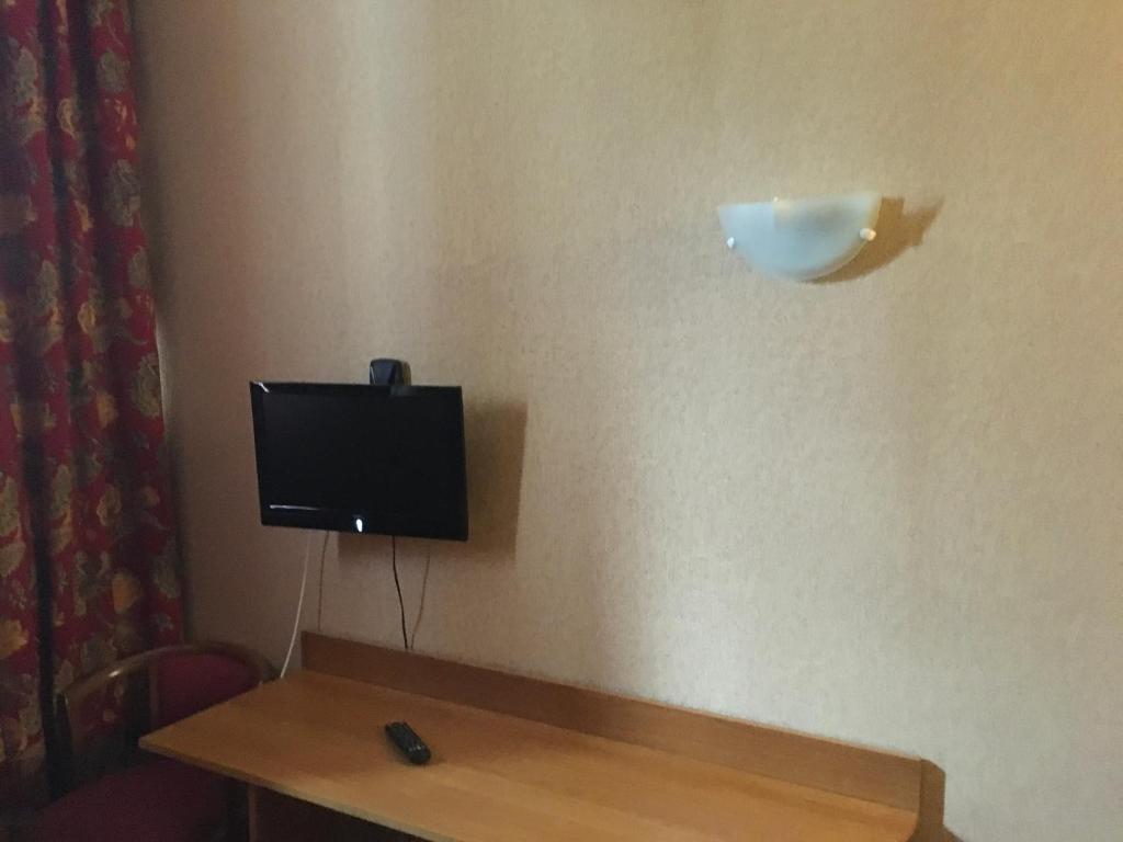 TV a/nebo společenská místnost v ubytování Hotel Dorele