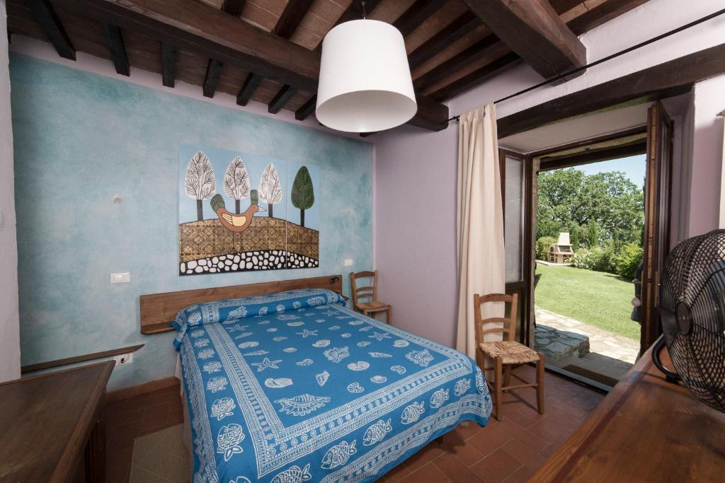 Postel nebo postele na pokoji v ubytování Sasseta Alta