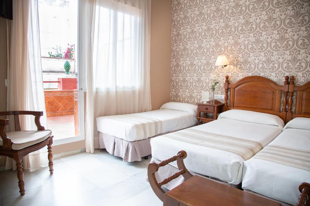 Posteľ alebo postele v izbe v ubytovaní Casa Palacio Don Pedro