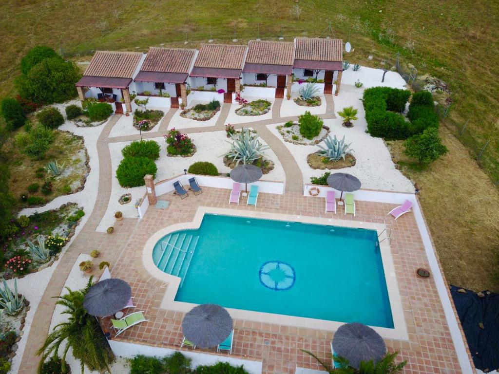 A view of the pool at Cortijo Valverde Alora or nearby