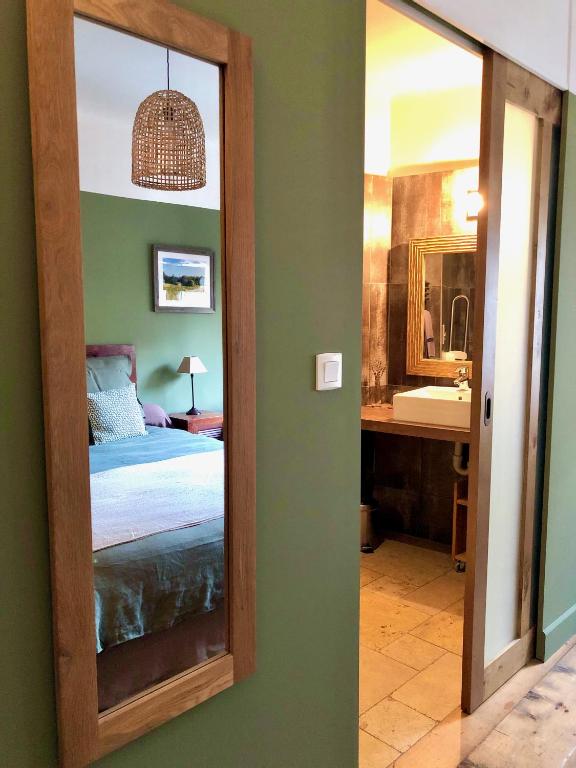 Postel nebo postele na pokoji v ubytování L'Autre Maison