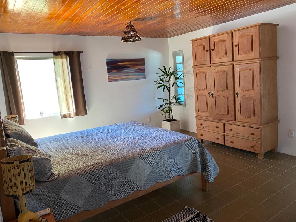 Postel nebo postele na pokoji v ubytování Taverna do Paraiso