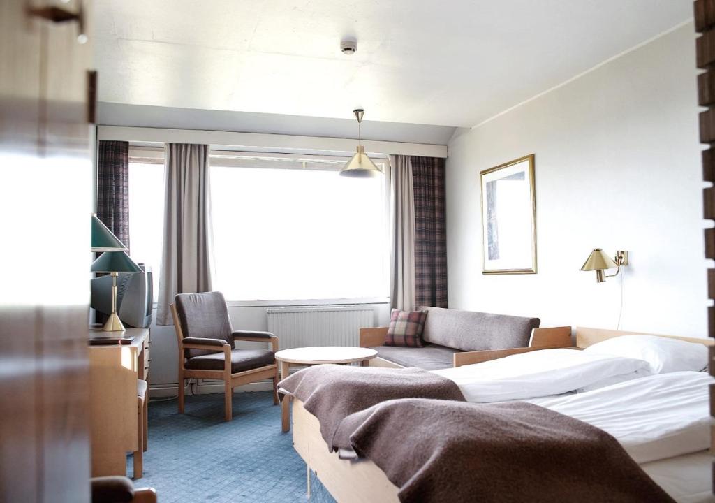Postel nebo postele na pokoji v ubytování Oset Fjellhotell