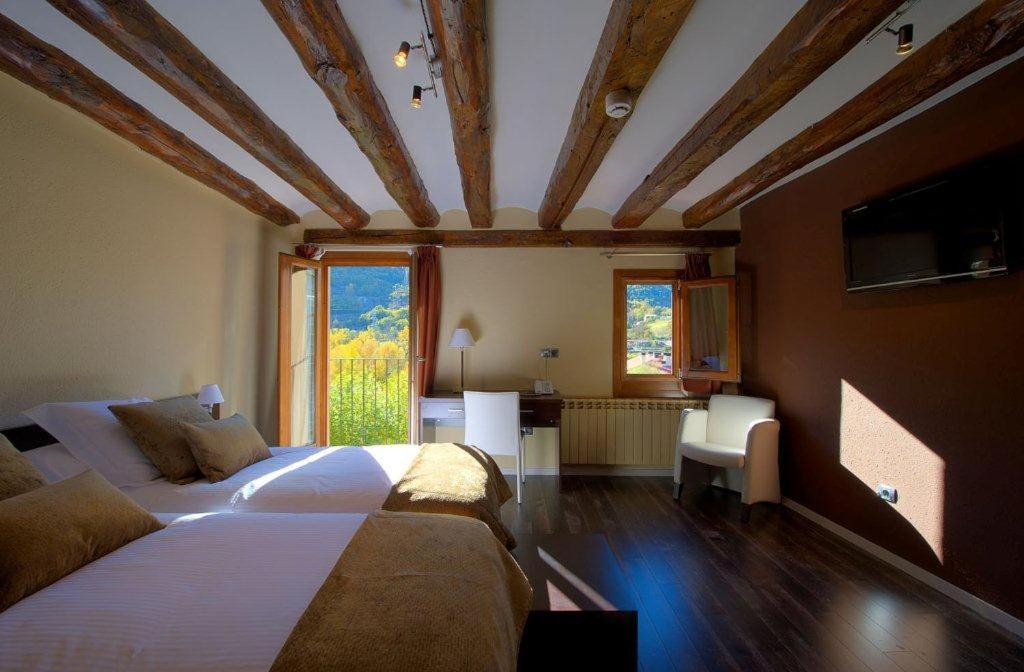 Postel nebo postele na pokoji v ubytování Hotel Cotori