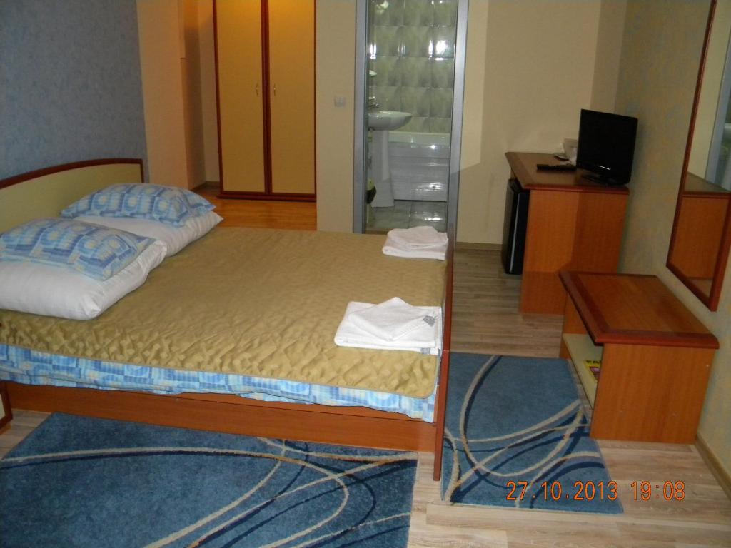 Postel nebo postele na pokoji v ubytování Vila Meteor