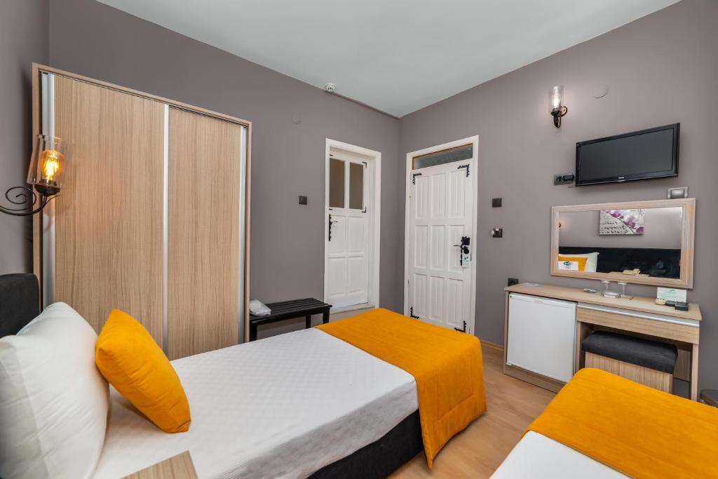 Kuchyň nebo kuchyňský kout v ubytování Yasemin Hotel