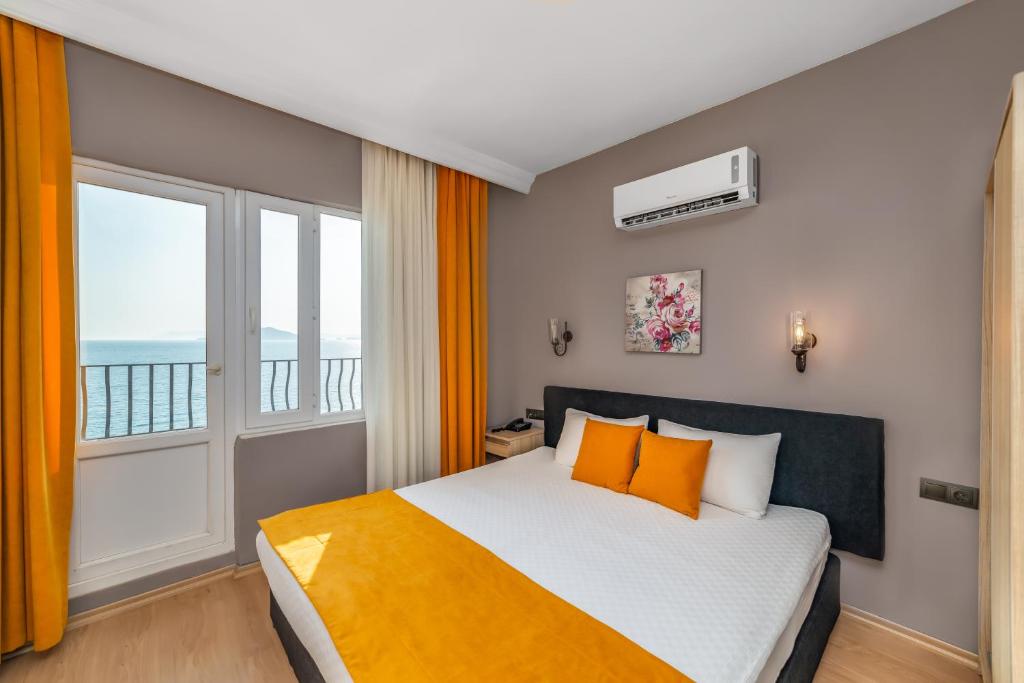Postel nebo postele na pokoji v ubytování Yasemin Hotel