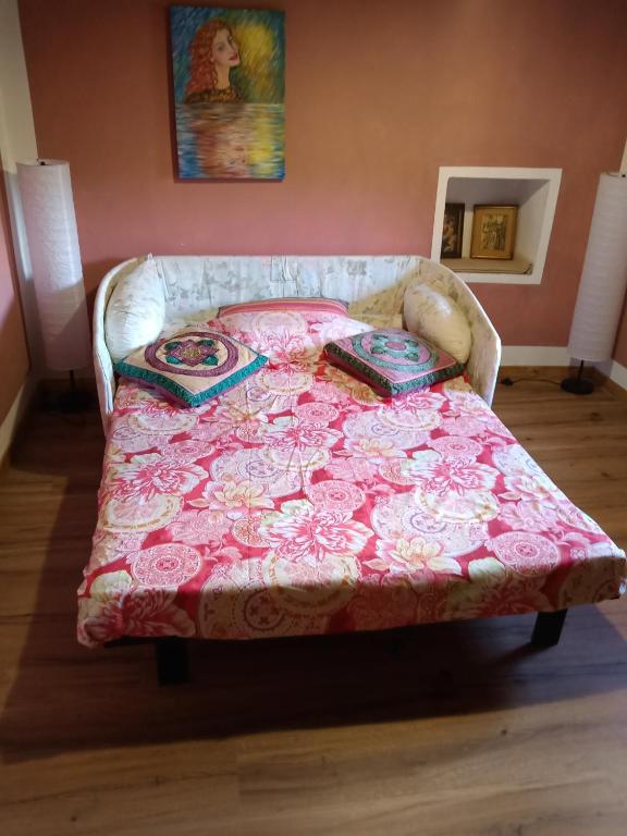 Postel nebo postele na pokoji v ubytování Bed and Breakfast Balli coi Lupi