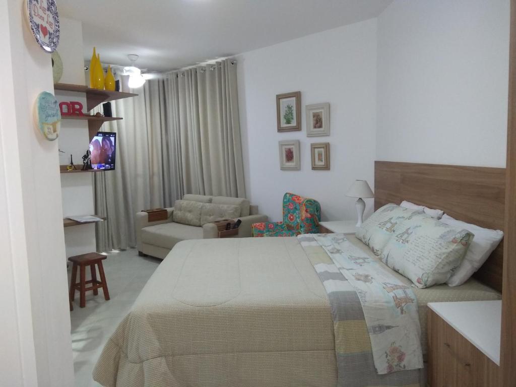 A bed or beds in a room at Loft Condado Aldeia dos Reis 216