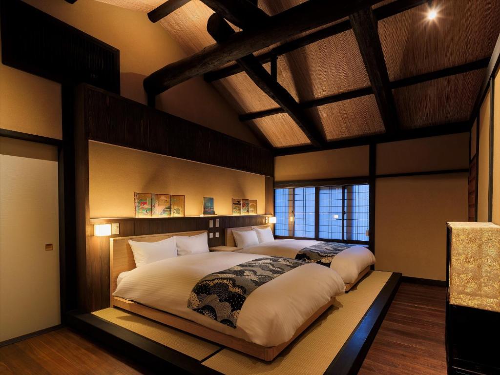 京都市にある紡 西洞院花屋町のベッドルーム1室(大型ベッド1台付)
