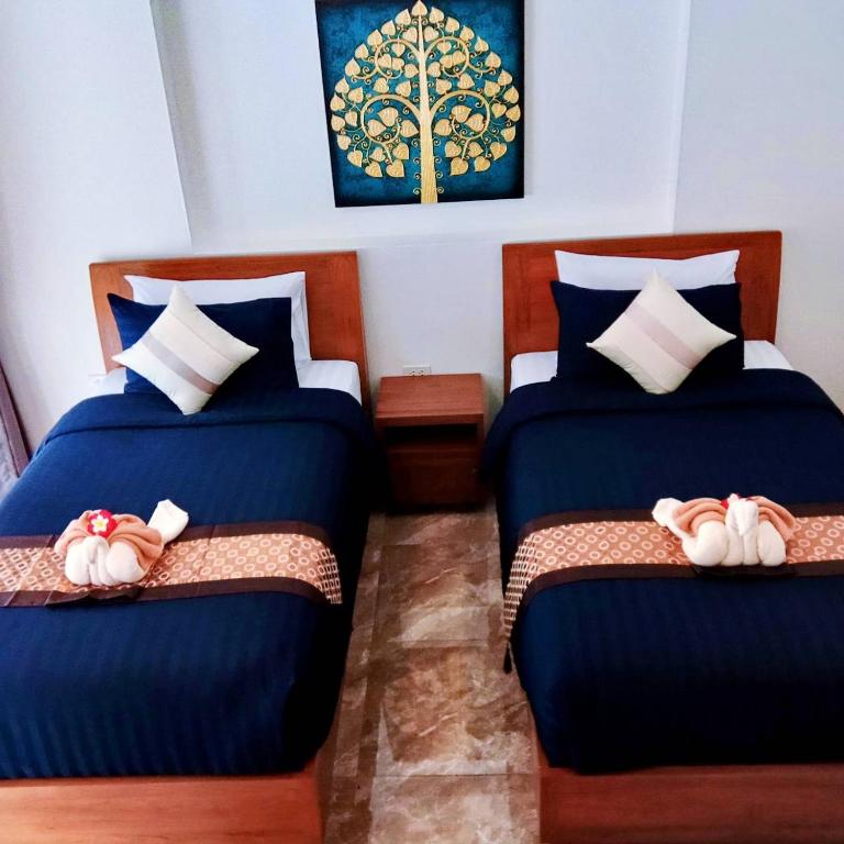 Postel nebo postele na pokoji v ubytování Orange palm pool villa