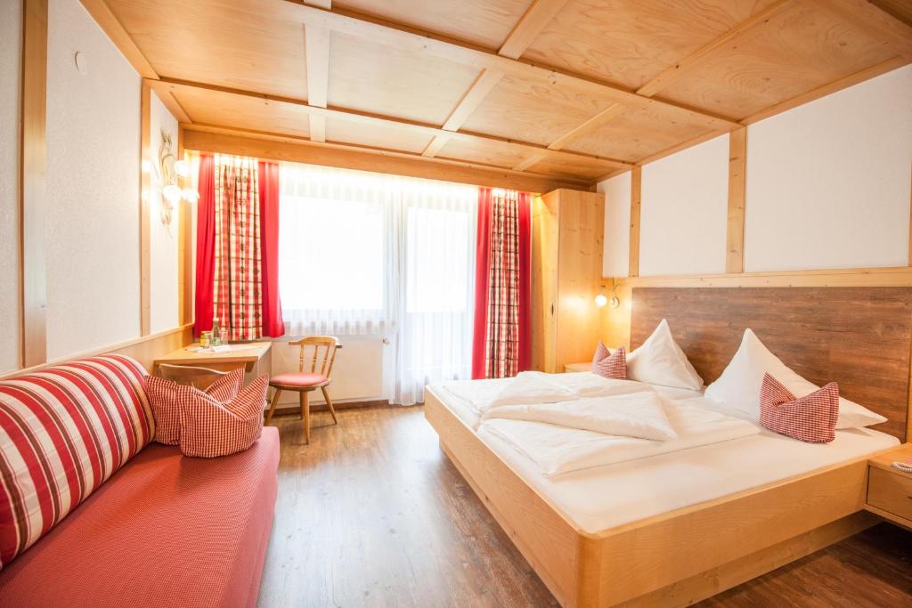 Postel nebo postele na pokoji v ubytování Hotel Angelika