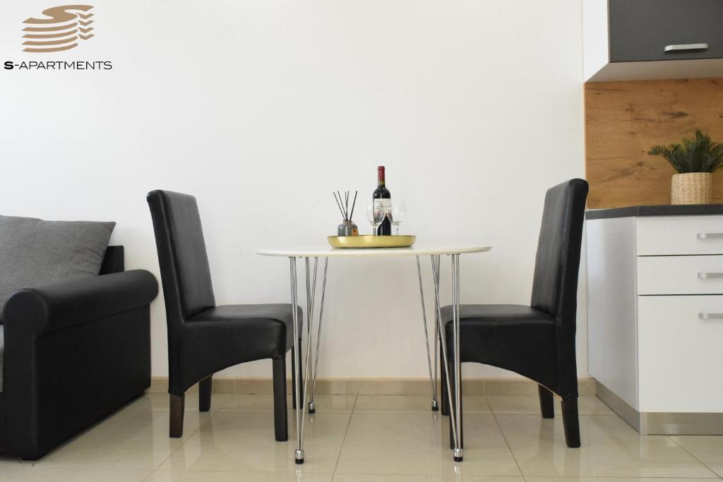 Kuchyň nebo kuchyňský kout v ubytování S-Apartmani Cocetova