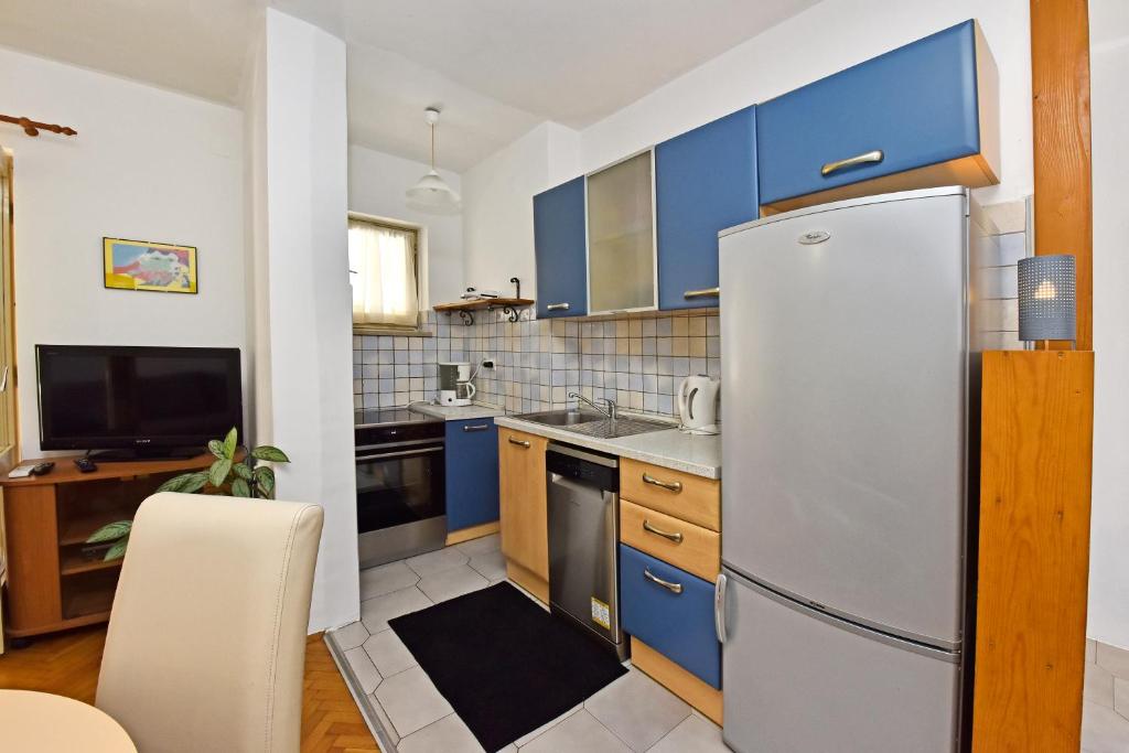 Kuchyň nebo kuchyňský kout v ubytování Apartment Nikola
