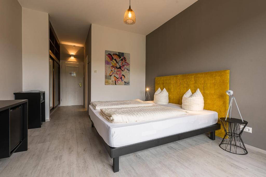 Postel nebo postele na pokoji v ubytování Hotel Parks