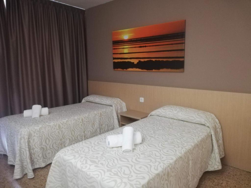 Postel nebo postele na pokoji v ubytování Apartamentos Orvay