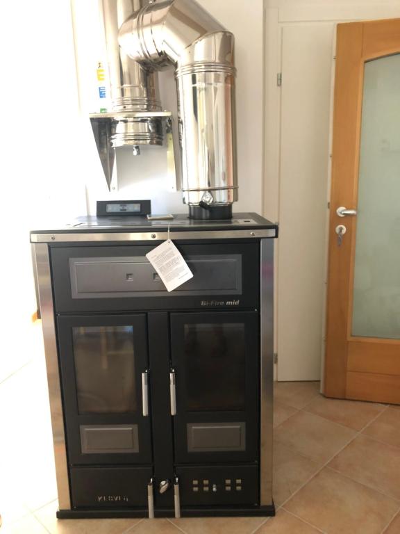 Kuchnia lub aneks kuchenny w obiekcie Appartamento Primiero San Martino di Castrozza