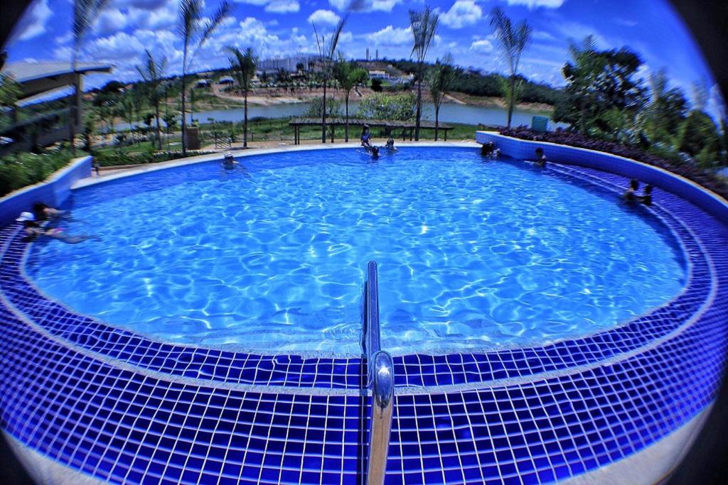 Bazén v ubytování Ilhas do Lago Eco Resort nebo v jeho okolí