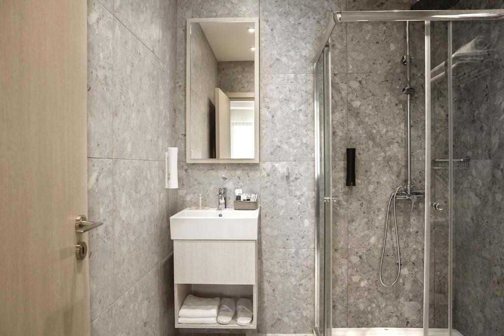Koupelna v ubytování Roseum Boutique Hotel