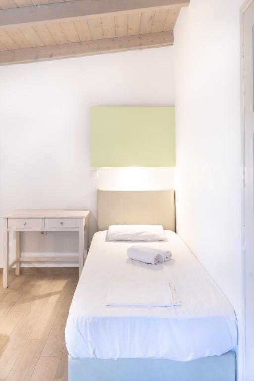 Łóżko lub łóżka w pokoju w obiekcie Apartments Korakakis Beach