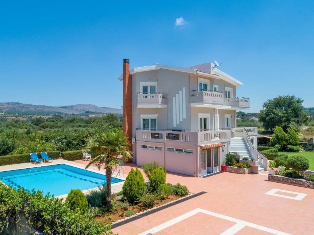 an image of a villa with a swimming pool at Villa Marianna in Vryses