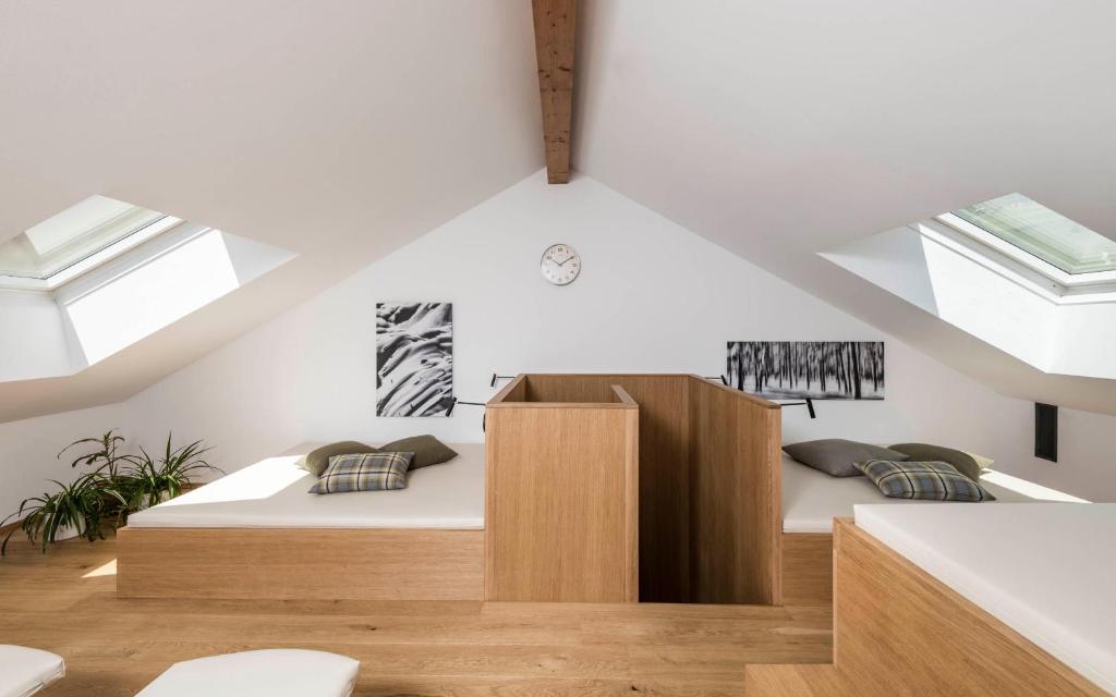 Postel nebo postele na pokoji v ubytování Boutique & Gourmet Hotel Orso Grigio