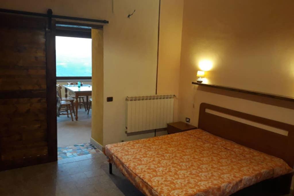 A bed or beds in a room at PANORAMIKA